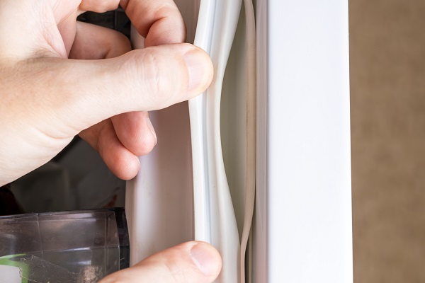 Checking the Door Seals (How to Troubleshoot and Fix a Whirlpool Refrigerator Not Cooling)